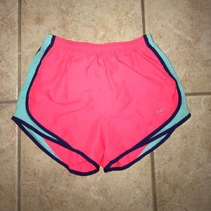 Pink Nike athletic shorts